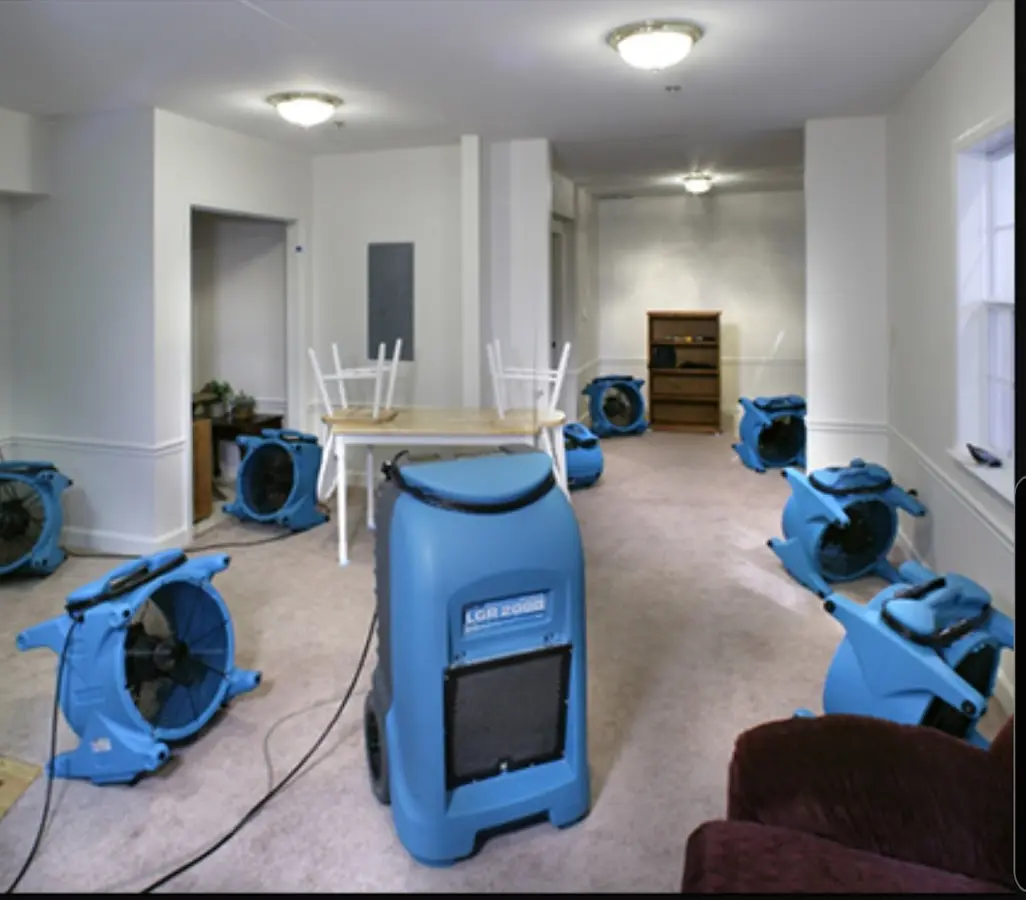 Air movers and dehumidifier setup for Water Extraction & Removal in Bolton